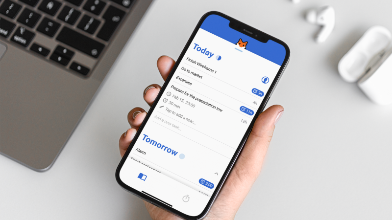 mockup-of-a-woman-taking-her-iphone-12-pro-max-from-her-desk-m28885